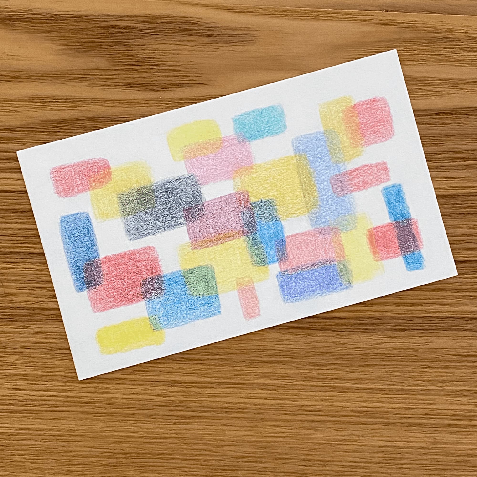 colored pencil sketch of slightly oveerlapping rectangles in shades of blue, red and yellow