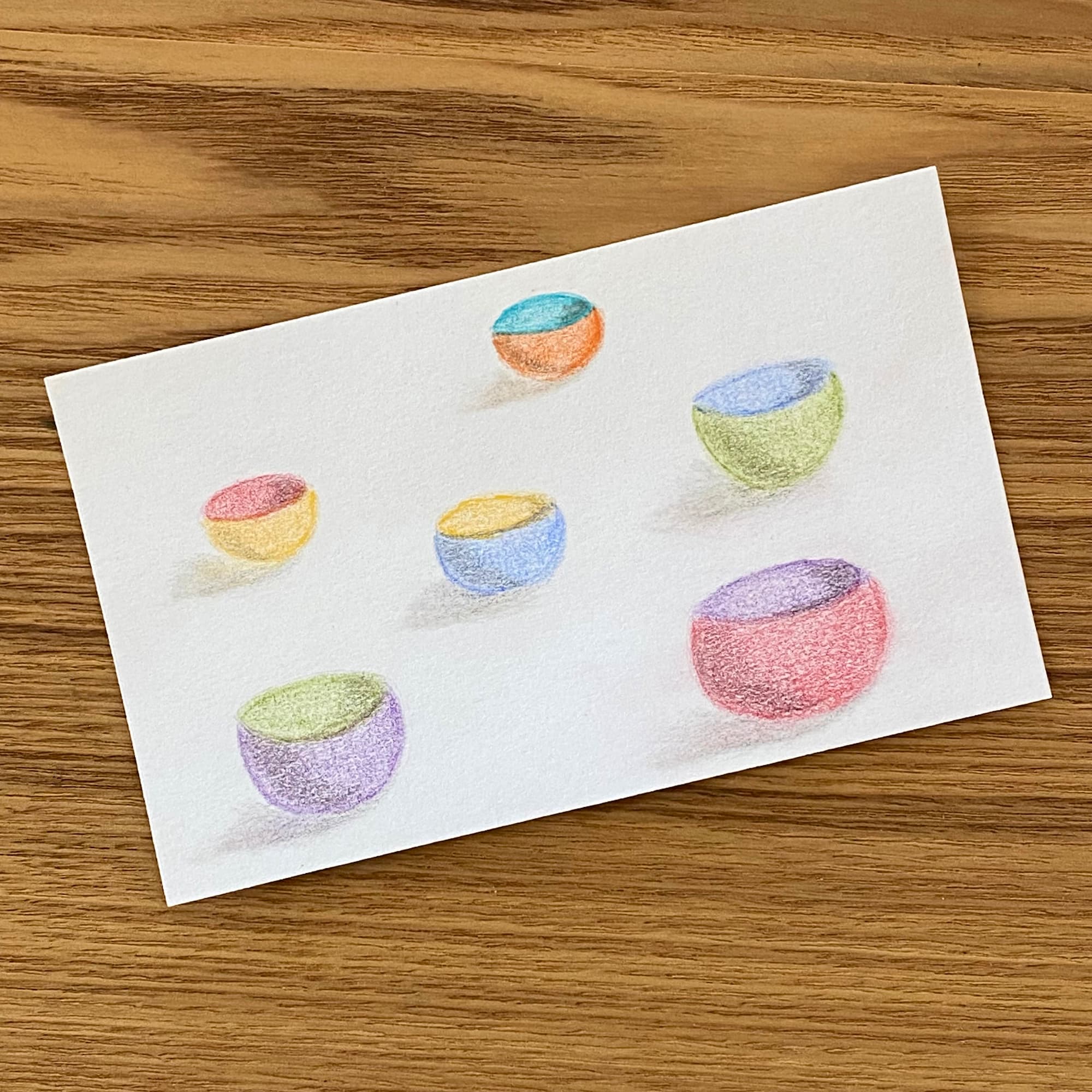 colored pencil sketch of 6 multicolor bowls in red, purple, green, light blue, yellow, orange and turquoise