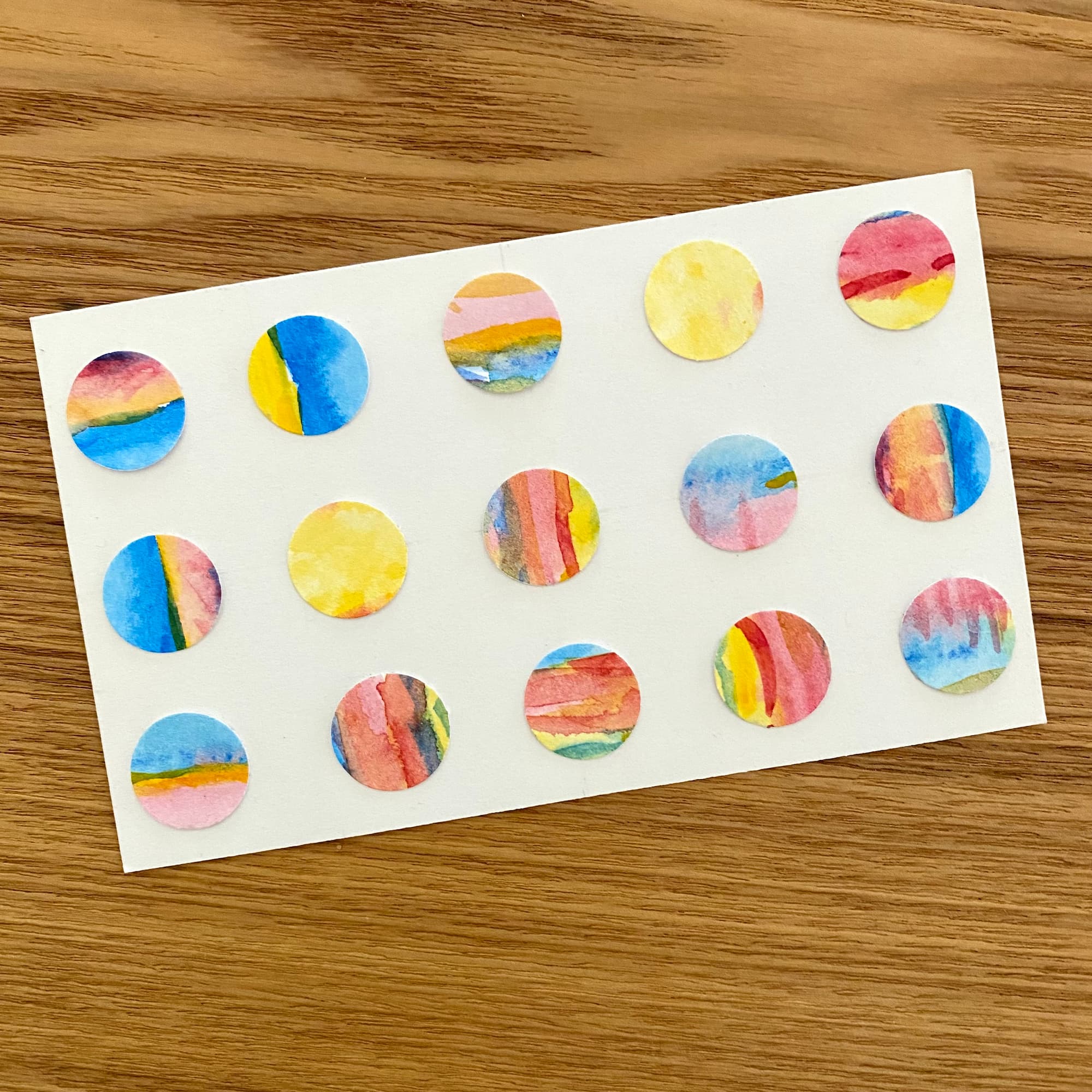 abstract collage with circle made with watercolors