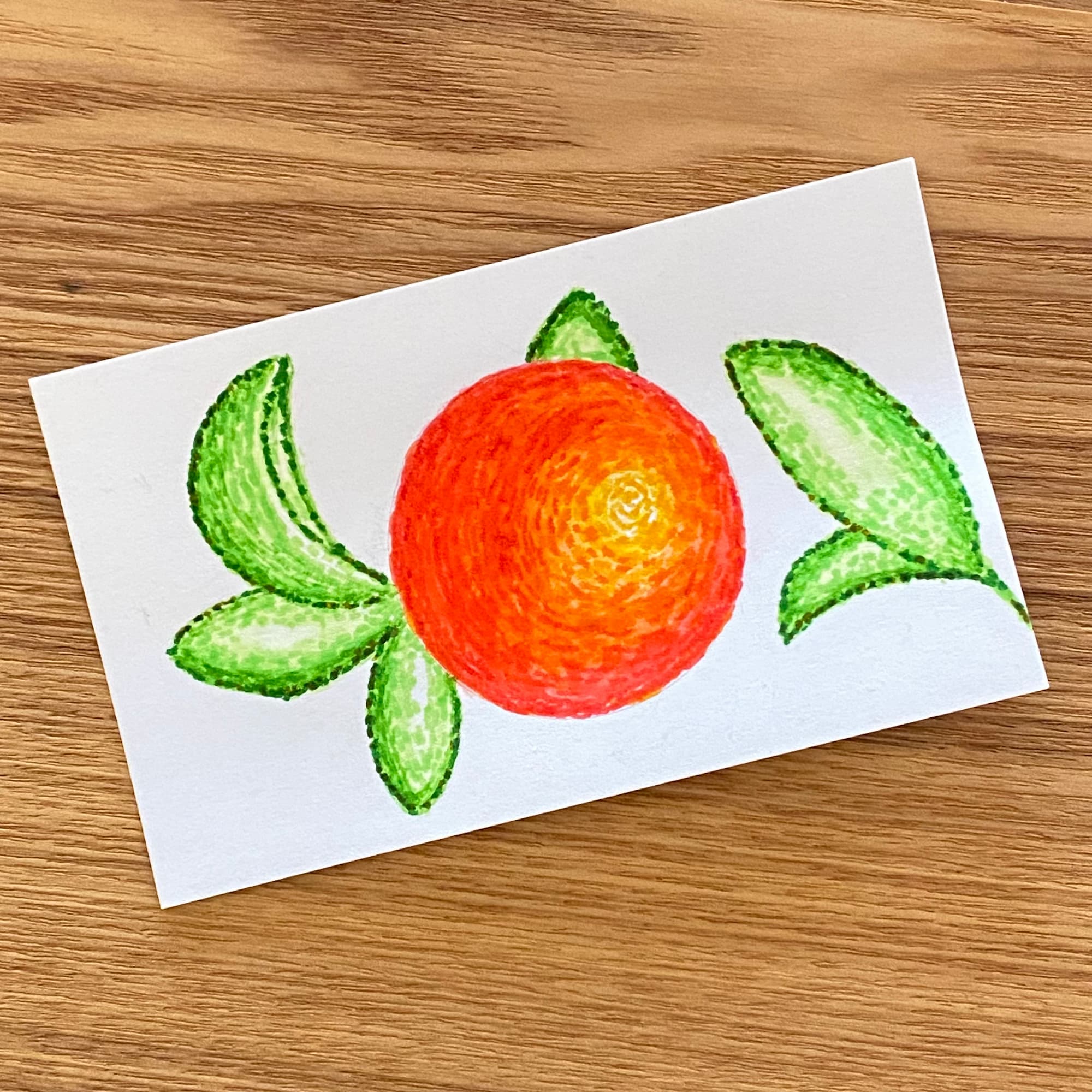 sketch of a vivid orange and surrounding leaves down with watercolor markers in small brush strokes