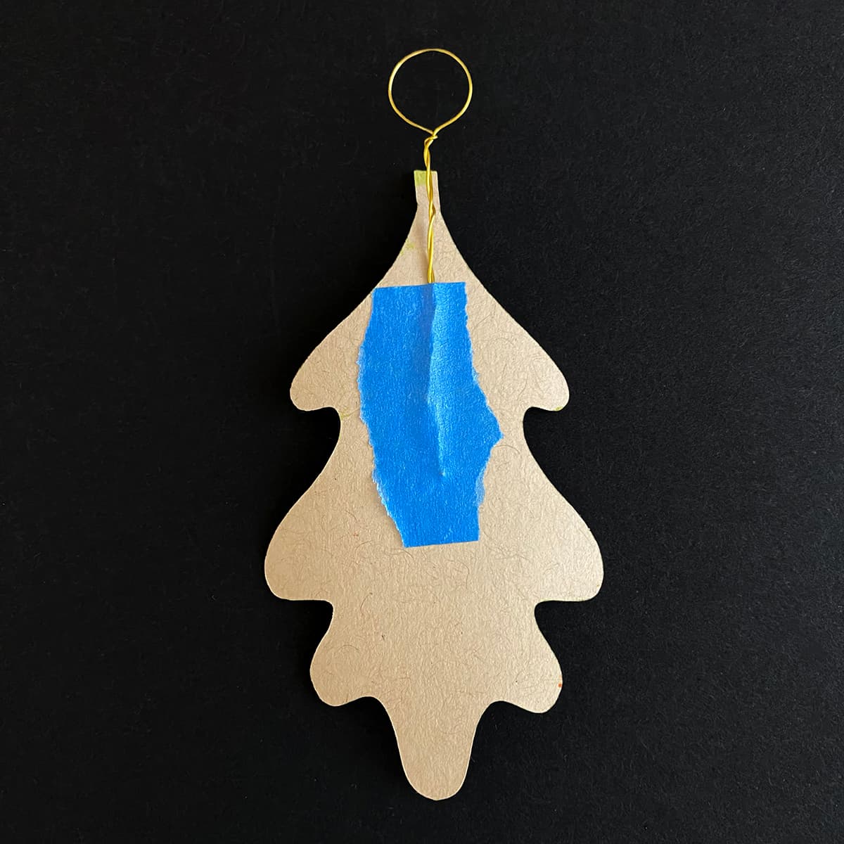 Attaching painted leaves to pins for DIY acorn and leaf garland, from Cakewalk DIY Paper Craft tutorial.