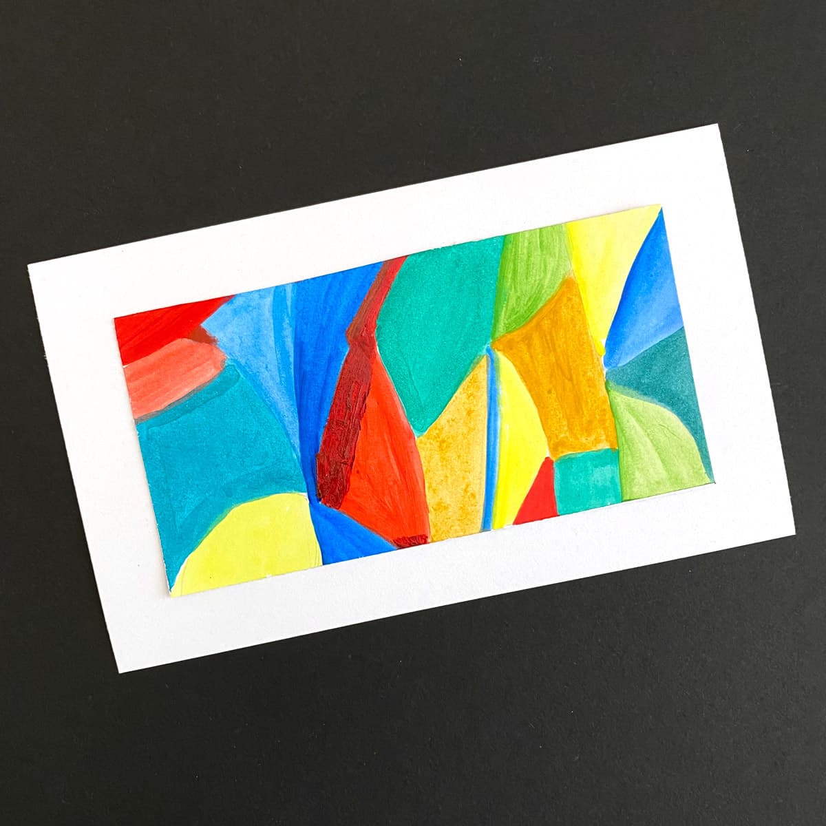 Index card with a multicolor abstract geometric painting in acrylics on a black background by Mozaic Studio for ICAD 2025