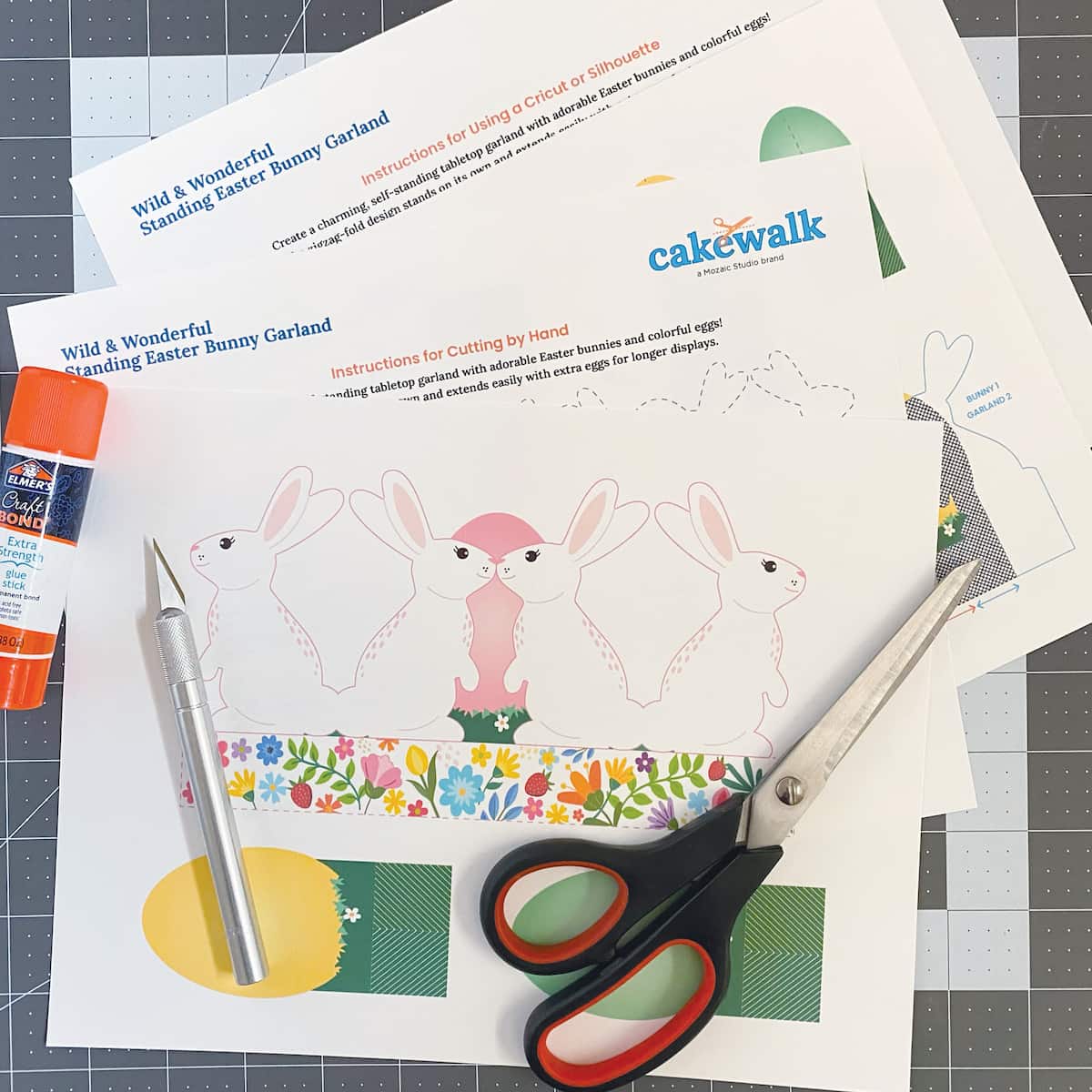 Printable standing bunny garland template and instructions on cutting mat with scissors, glue stick, and X-acto knife – instant digital download Easter table decor