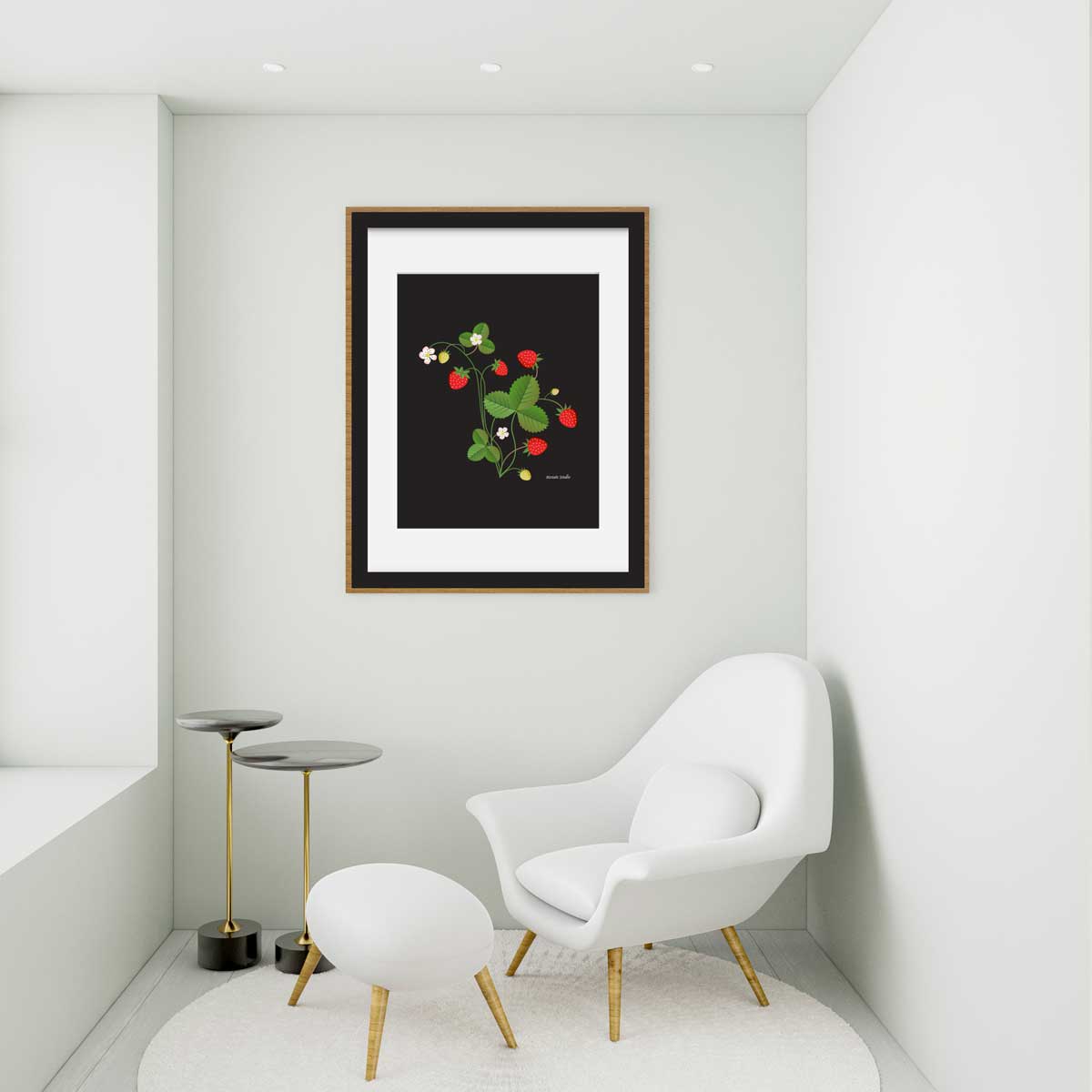 Modern interior with a white chair, ottoman, and small table against a wall with framed artwork of illustrated strawberries.